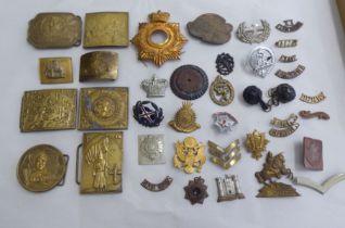 Brass, steel and other metal badges and buckles: to include US Military examples (Please Note: