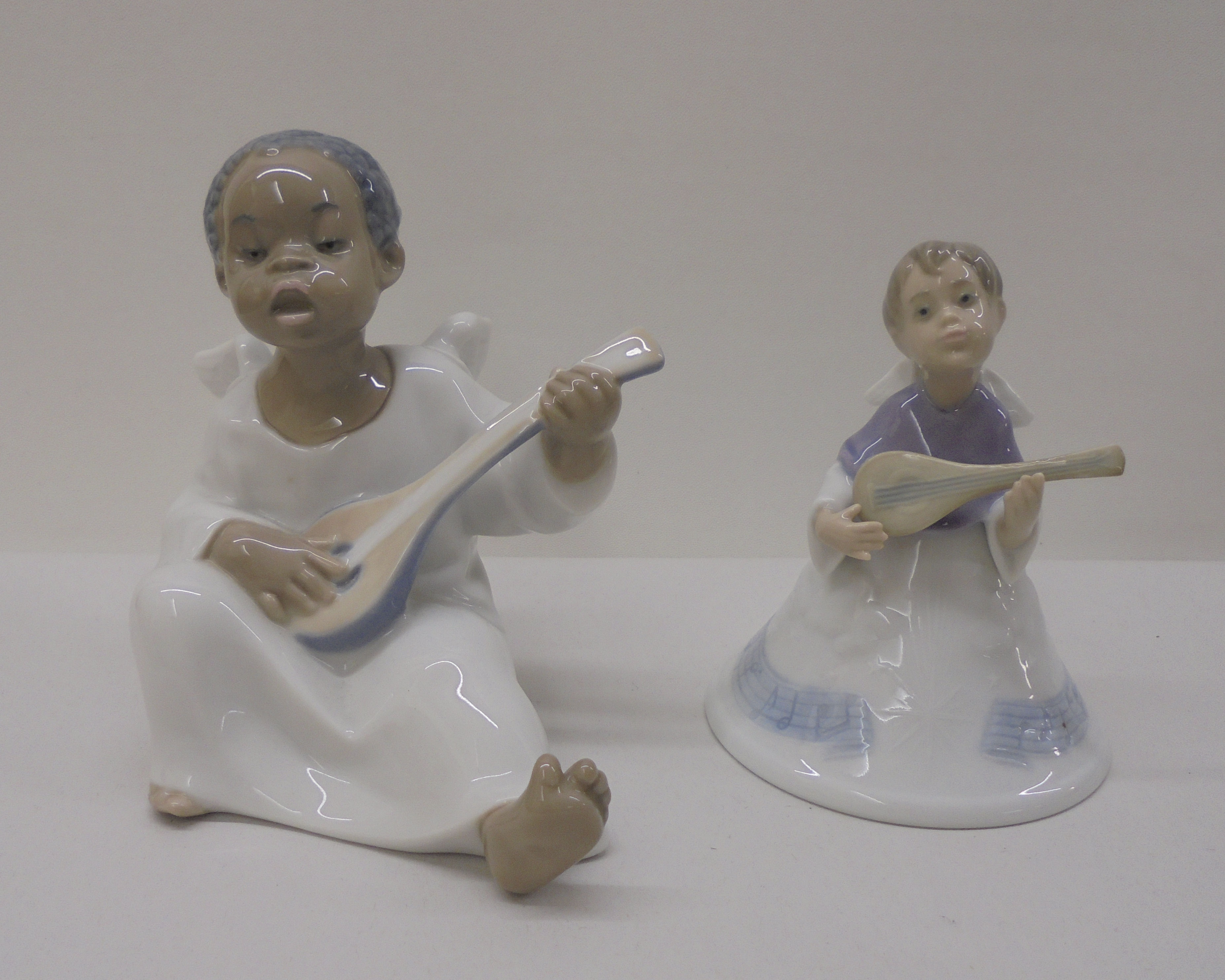 Three Lladro, three Nao and one Nadal porcelain figures: to include a seated angelic figure  4"h - Image 8 of 13