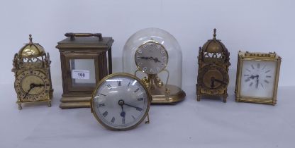 Clocks: to include a brass lantern design example, faced by a Roman dial  8"h