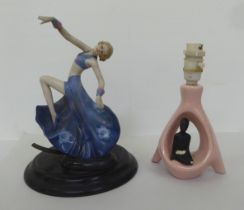 An Art Deco table lamp, fashioned as an exotic dancer, on a plinth  16"h; and a 1960s lamp,
