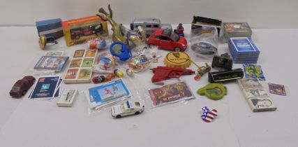 A mixed lot: to include diecast model vehicles with a boxed example by Corgi; and a cast brass