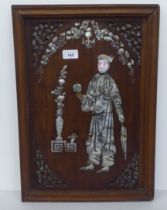 A mid 20thC Chinese mother-of-pearl inlaid fruitwood carved panel, depicting a figure  20" x 14"