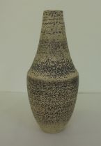 A studio pottery vase of tapered form, decorated in textured monochrome  bears an LR mark  12"h