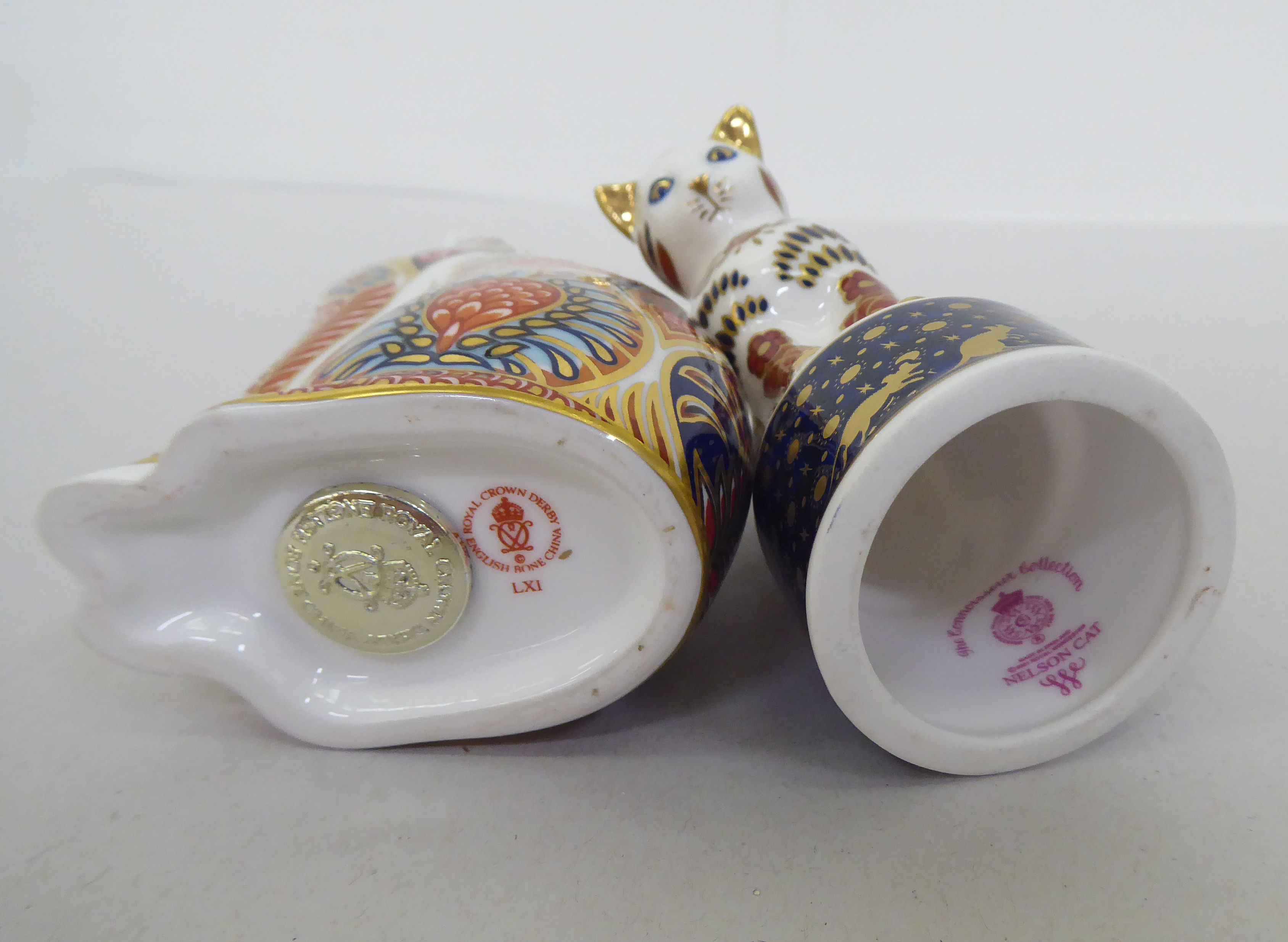 One Royal Worcester and six Royal Crown Derby china model cats, one with a silver stopper, the other - Image 10 of 13