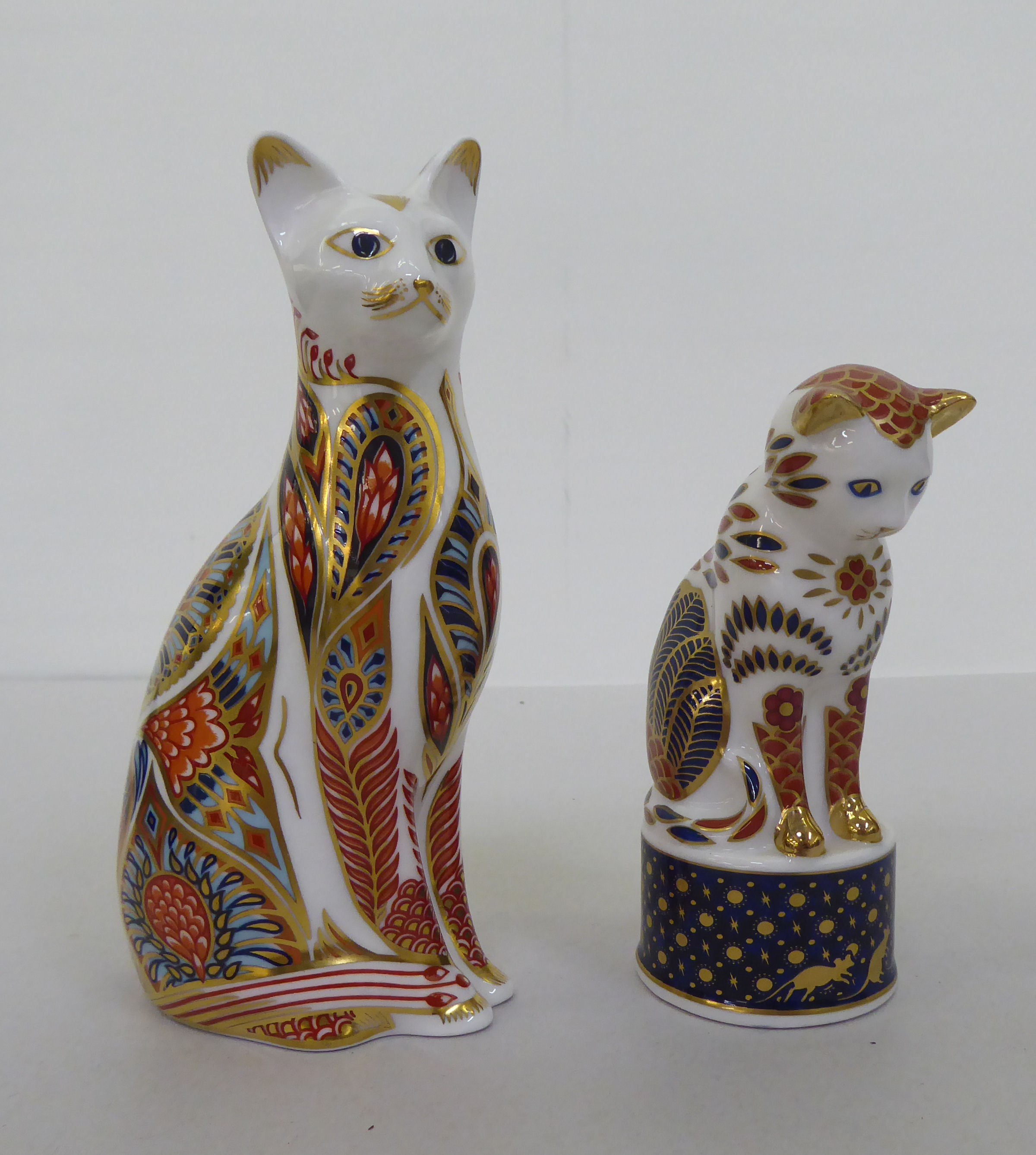 One Royal Worcester and six Royal Crown Derby china model cats, one with a silver stopper, the other - Image 8 of 13