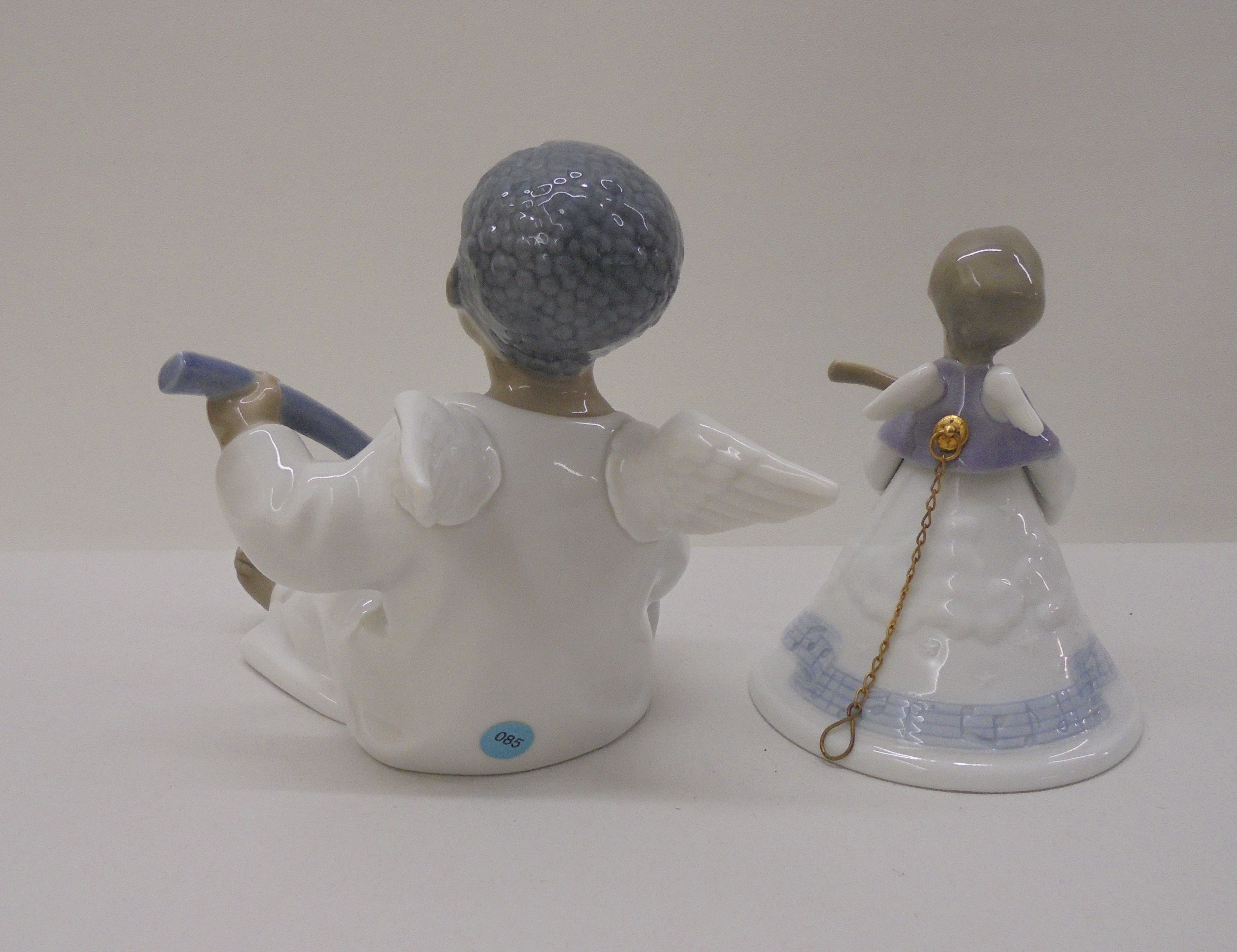 Three Lladro, three Nao and one Nadal porcelain figures: to include a seated angelic figure  4"h - Image 9 of 13