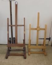 Two similar table top, height adjustable artists easels