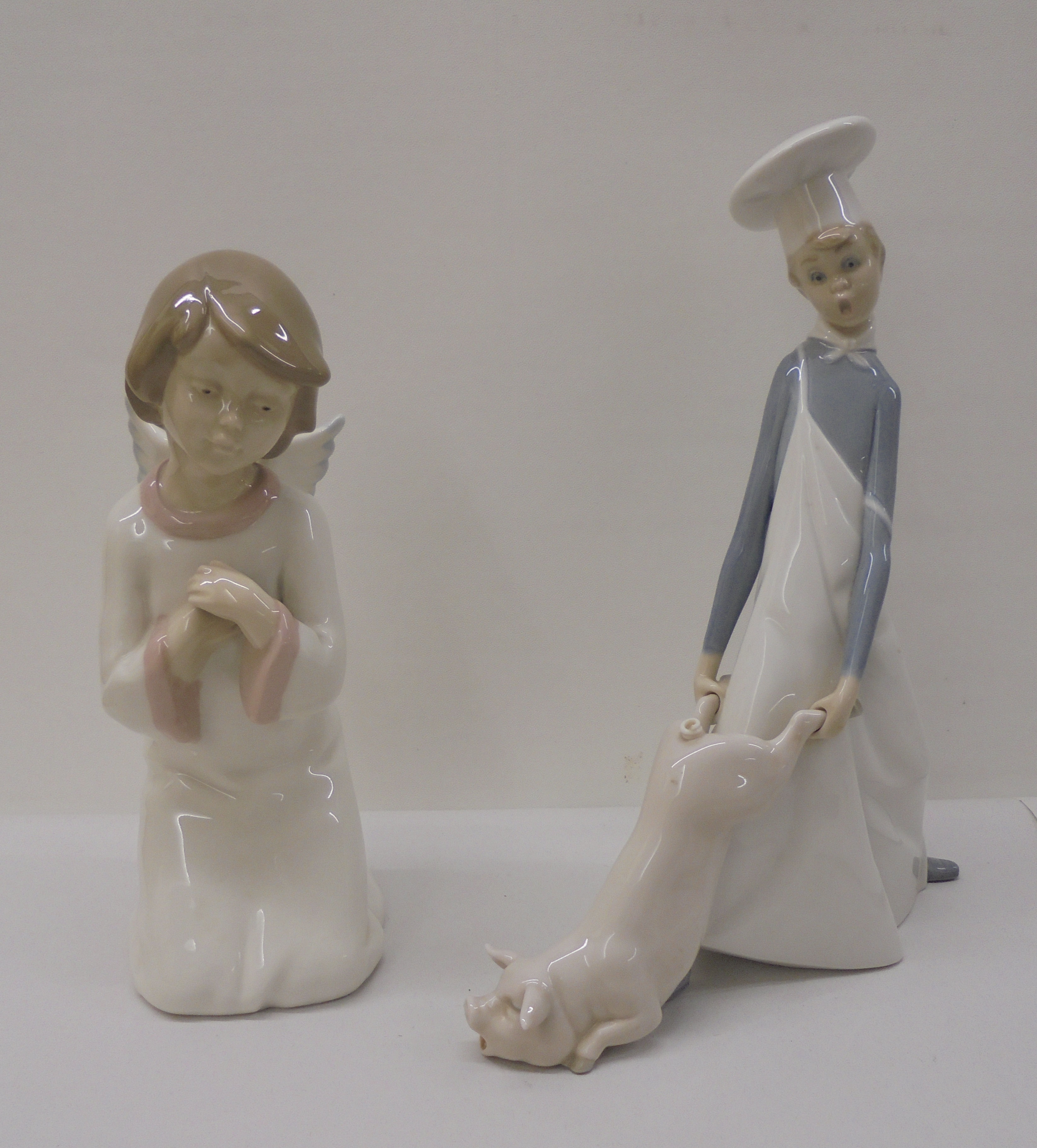 Three Lladro, three Nao and one Nadal porcelain figures: to include a seated angelic figure  4"h - Image 5 of 13