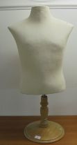 A fabric covered mannikin  35"h