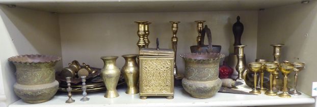 Mainly 20thC metalware: to include a school hand bell; and various brass candlesticks  tallest 12"h