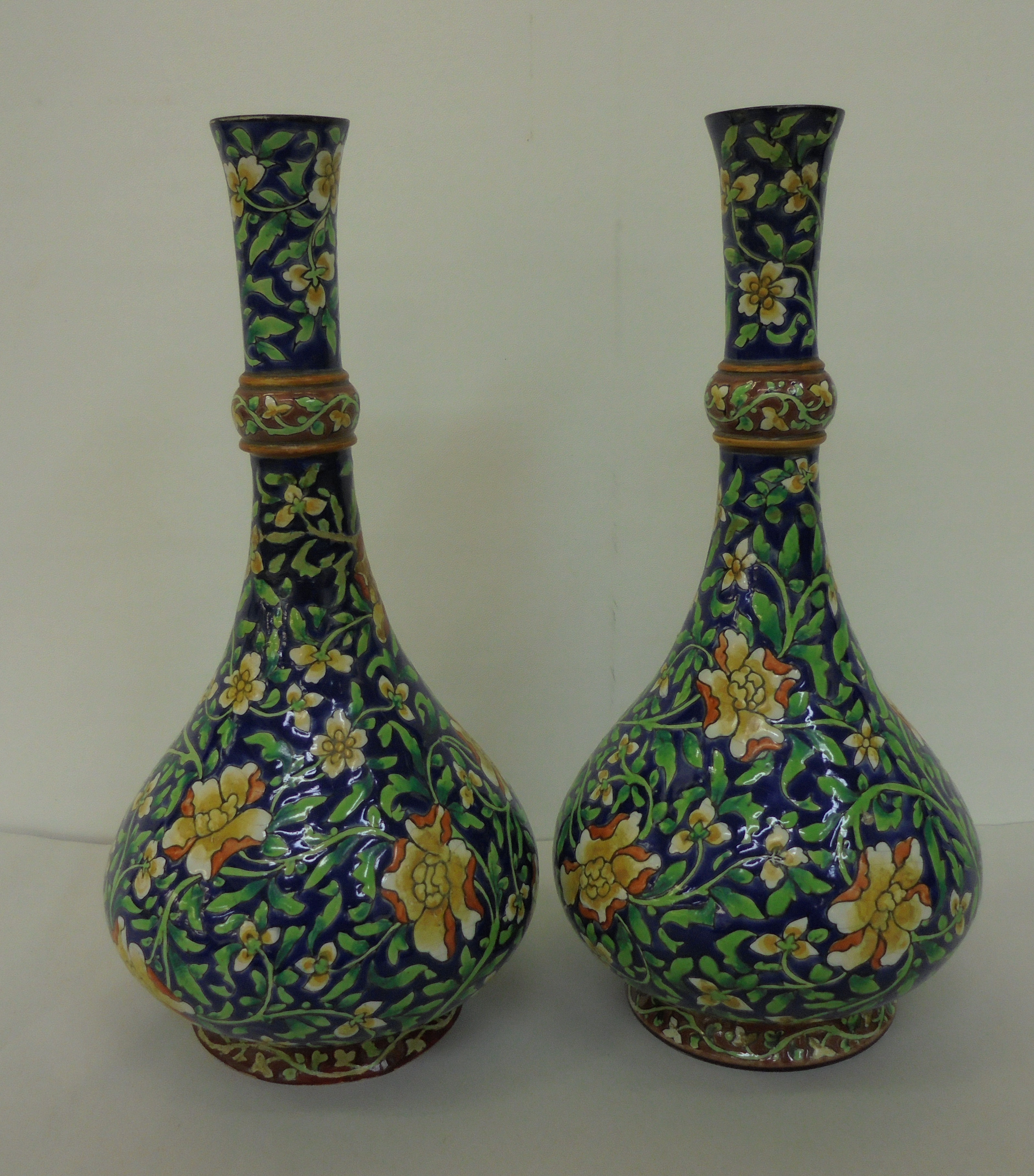 A pair of British Art pottery Arts & Crafts faience vases, decorated in colours with scrolled - Image 3 of 5