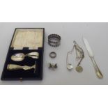 Silver and white metal collectables: to include items of personal ornament; and napkin rings