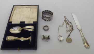 Silver and white metal collectables: to include items of personal ornament; and napkin rings