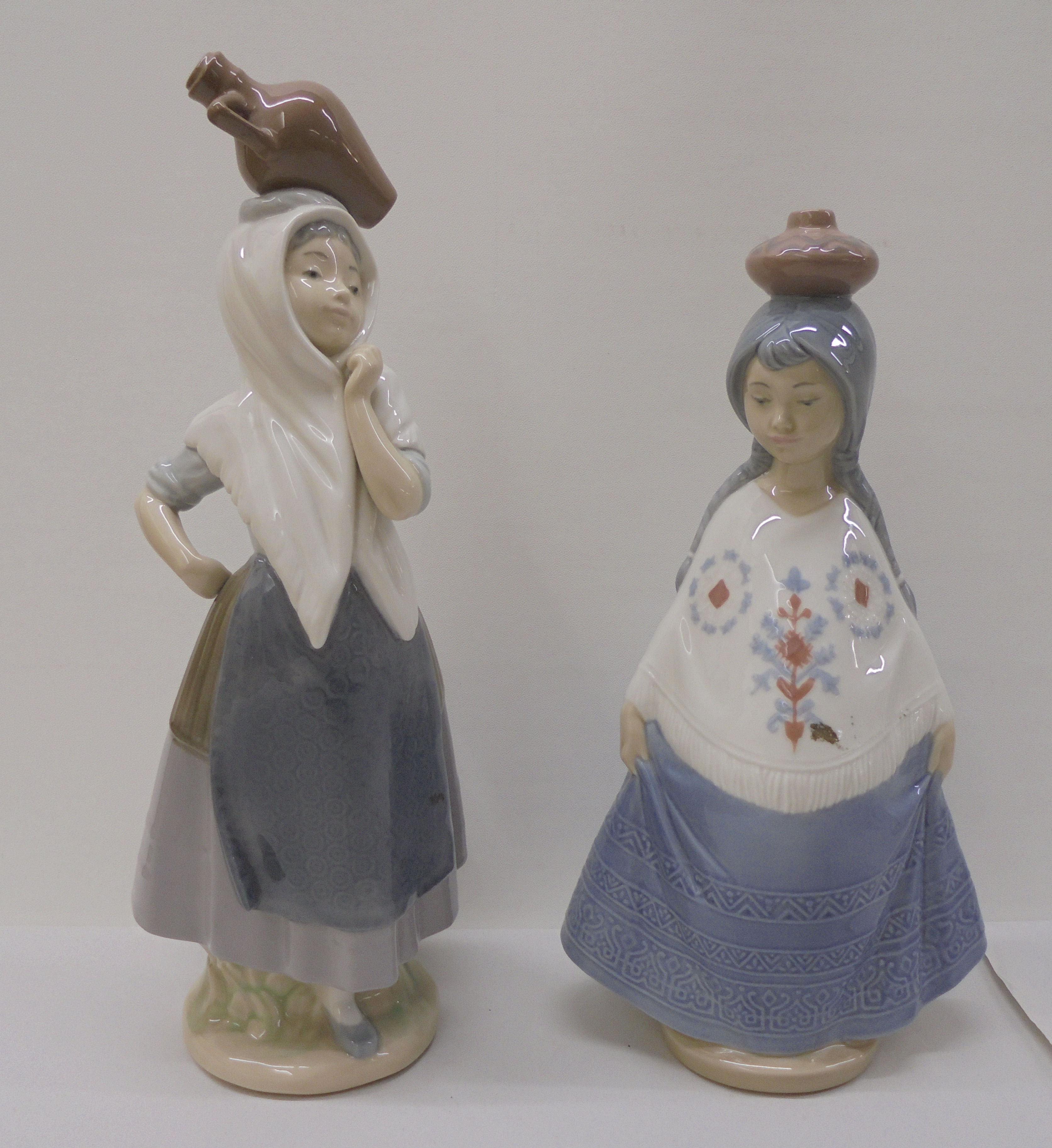 Three Lladro, three Nao and one Nadal porcelain figures: to include a seated angelic figure  4"h - Image 2 of 13