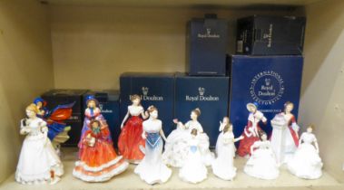 Fourteen Royal Doulton china figures: to include 'Christmas Morn'  HN1992  7"h; and 'Victorian Lady'
