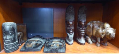 Carved wooden collectables: to include busts  masks and a water buffalo