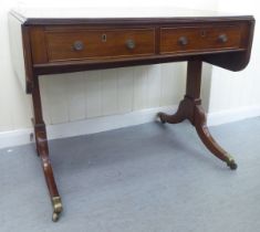 A late 19thC mahogany sofa table with two frieze drawers and two facsimiles on the obverse, raised