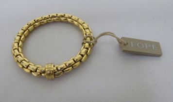 An 18ct gold FOPE designer flexible bracelet