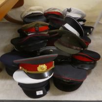 Various peaked caps