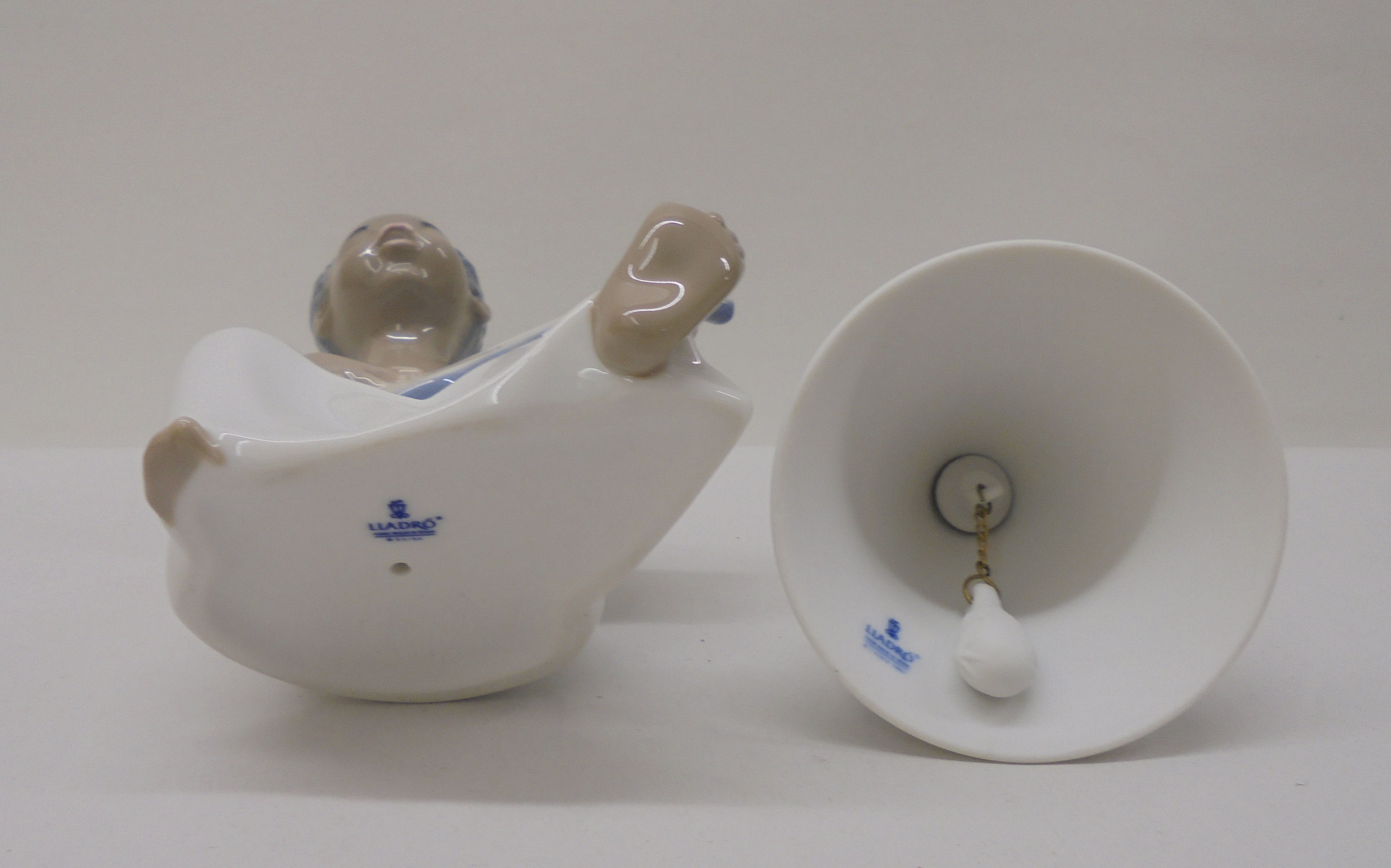 Three Lladro, three Nao and one Nadal porcelain figures: to include a seated angelic figure  4"h - Image 10 of 13
