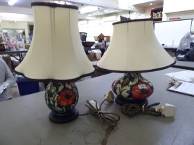 Two modern Moorcroft pottery Poppy pattern table lamps, viz. one of squat, bulbous form; the other