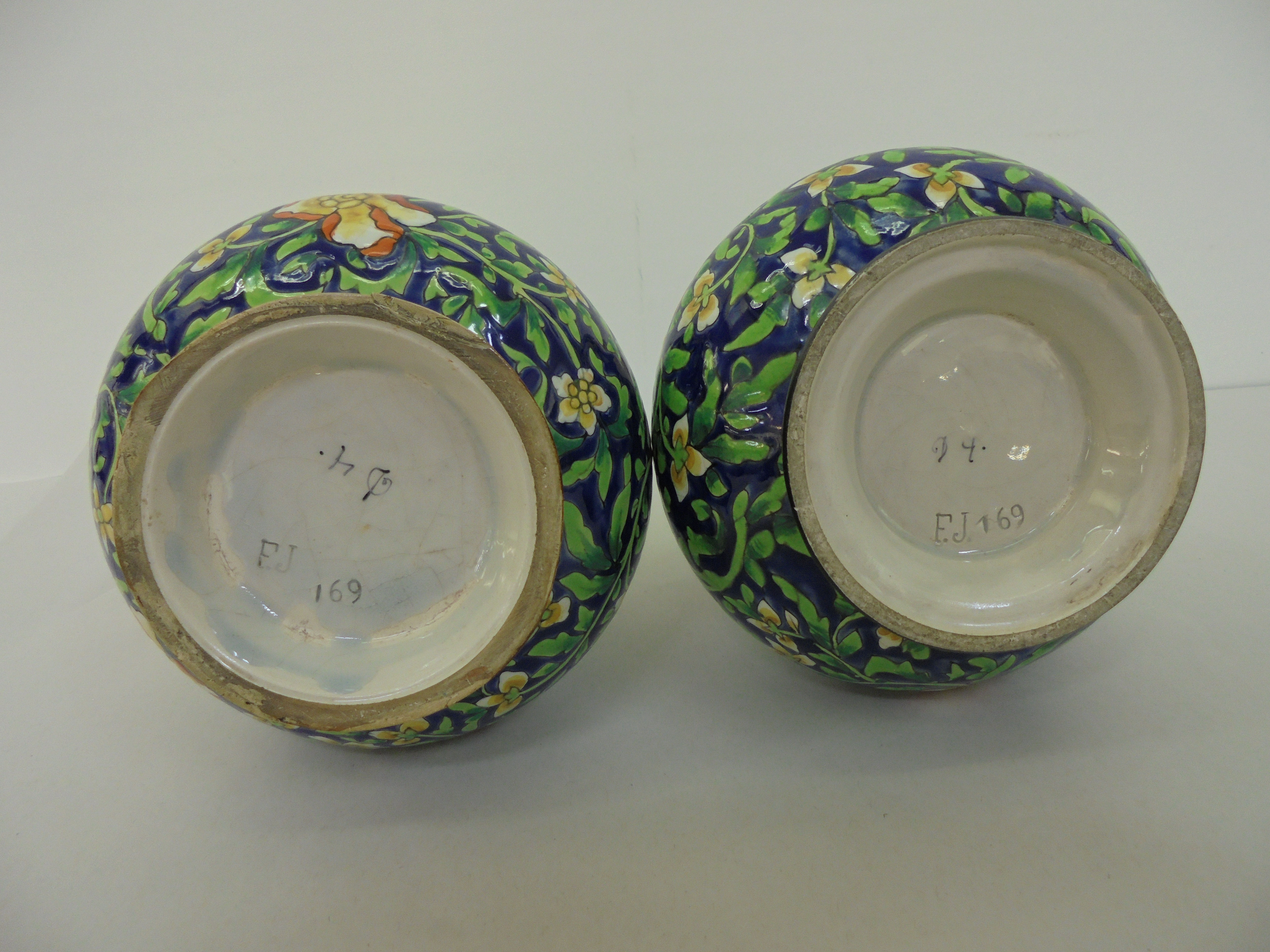 A pair of British Art pottery Arts & Crafts faience vases, decorated in colours with scrolled - Image 4 of 5