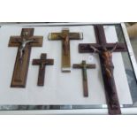 Five various wooden crucifix, the largest featuring a copper finished Corpus Christie  22"h