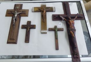 Five various wooden crucifix, the largest featuring a copper finished Corpus Christie  22"h