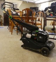 A Hayter Harrier model 41 petrol driven lawn mower with a 22"dia cut and grass box