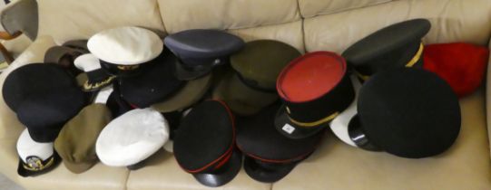 Various peaked caps