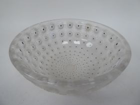 A Lalique clear and frosted crystal Nemours pattern bowl, featuring deeply moulded, black enamel