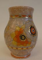 An early 20thC Crown Ducal Charlotte Rhead gilded and tubeline pottery vase of bulbous form,