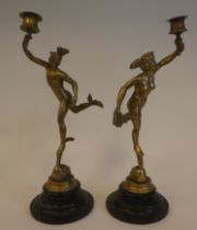 A pair of classically inspired cast brass figures 'Mercury' running with a candlestand and his