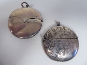 An Edwardian silver disk design vesta case of rotating eyebrow design with a strike plate and
