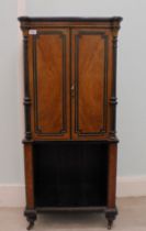 A late Victorian ebonised and figures walnut breakfront music cabinet with gilded and gilt metal,