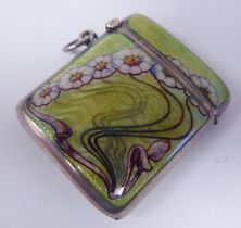 An Art Nouveau silver and coloured enamel vesta case of curved, square form, with a hinged cap,