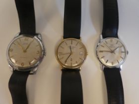 Three variously strapped stainless steel cased wristwatches, viz. a Nixe, a Marvin and a Mappin &