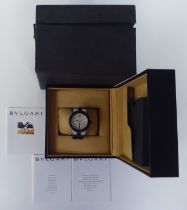 A Bvlgari Aluminium wristwatch, the case stamped AL 38A L9582, faced by a baton and Arabic dial,
