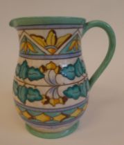 A Bursley Ware Charlotte Rhead pottery bulbous water jug, decorated in tubeline and colours and