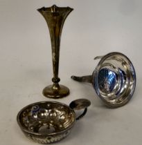 Silver items, viz. a loaded specimen vase  5.25"h; a wine taster with a tab and ring handle; and a