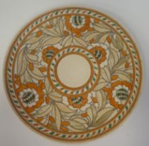 An early 20thC Crown Ducal Charlotte Rhead sponged, painted, gilded and tubeline pottery charger,