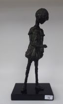 Alice Winant - a cast and patinated bronze standing figure, a young girl, on a black slate plinth