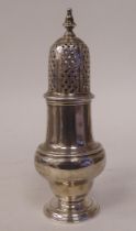 A George III silver caster of covered, pedestal vase design with a finial, on a stepped footrim  ID