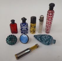 Seven various dissimilar antique glass and ceramic scent bottles of varying form: to include one