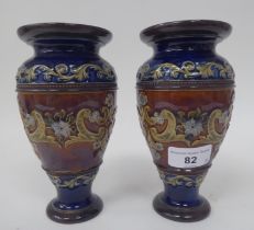 A pair of Royal Doulton stoneware ovoid shape, waisted pedestal vases, decorated in tones of blue
