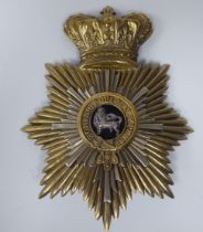 A large, early shako plate, surmounted by a crown and central lion (Please Note: this lot is subject
