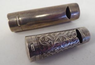 A late Victorian silver combination whistle and vesta case with bright-cut engraved ornament, a