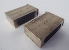 A pair of silver matchbox sleeves with hinged caps and provision for strike plates  ESB