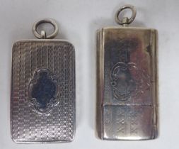 A mid Victorian engine turned and engraved miniature silver vesta case with a hinged lid, strike