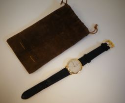 An 18ct gold cased Omega De Ville wristwatch, faced by a Roman and baton dial, incorporating